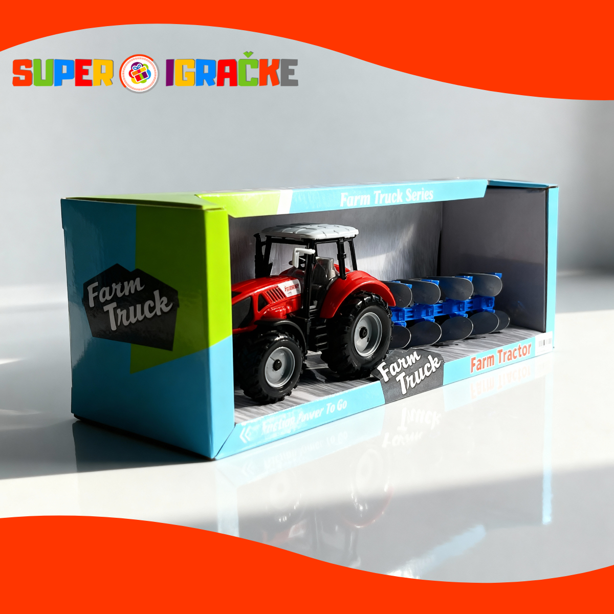 Traktor sa plugovima igračka