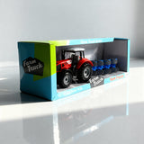 Traktor sa plugovima igračka